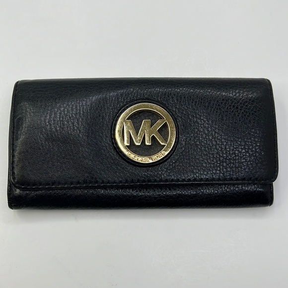 Michael Kors Handbags - MIICHAEL KORS Black Fulton Flap Leather Wallet With Gold Colored LOGO